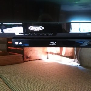 DVD player installed under TV