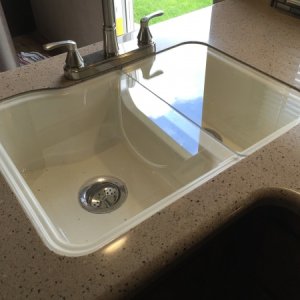 It did not come with covers for the sink, so I made some out of 1/4" plexiglass.  This is in 2 pieces so one side can be open.