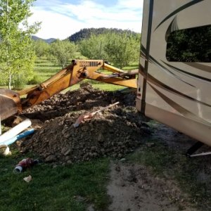 Sewer repair work behind our temporary "site" at Bauers Ranch RV park in Glendale, Utah