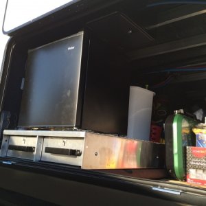 Mods - Installed 50" aluminum storage drawers with refrigerator and outdoor shower for hot and cold water. Hello outside kitchen...