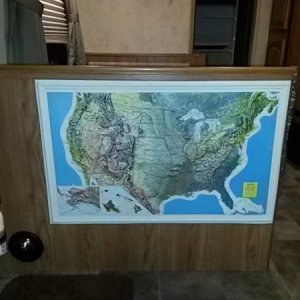 relief map of USA (this was mine - not included in camper purchase; it fits nicely in this area and protects the paneling in this high traffic area; t