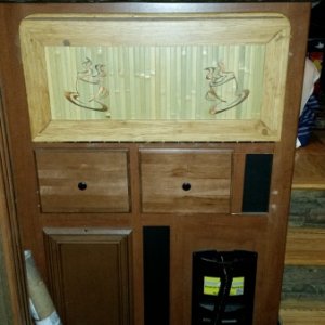 The fold down bar top I made in the closed position.
The left drawer holds one box  (80 K-Cup pods) of coffee perfectly.
The Right drawer holds a vari