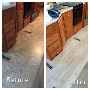 hubby surpirsed me with new flooring in the kitchen & bath areas