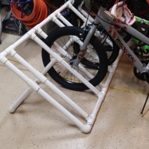 Simple PVC bicycle rack.  Plans can be found all over the internet.  Works great at campsite and allows a simple way to transport bikes in the bed of 