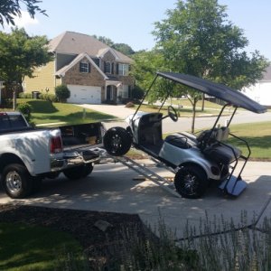 Loading the golf cart