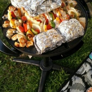 The O'l trusty electric"George Foreman"grill getting it done!Chicken shish kabob,with corn on the cobb night.