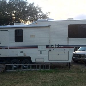 My second RV - a huge 5th wheel.  Did not like the stairs and closed off bedroom area.