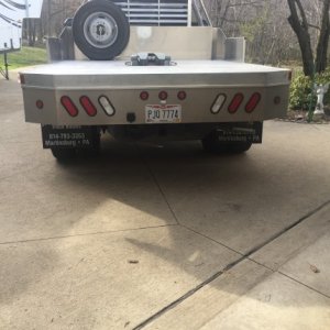 Moved the spare tire and installed the hitch plate.