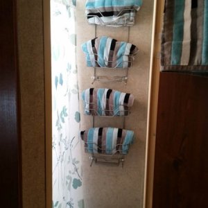 2x shower racks - cut off tops and screwed to wall