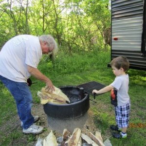 Grandpa and Ryan with setting up the fire pit for the evening.