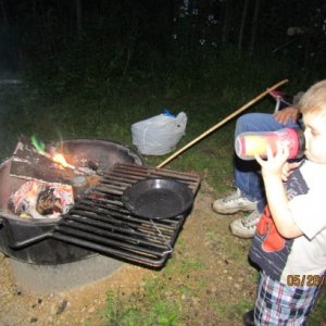 A good campfire with our grandson.