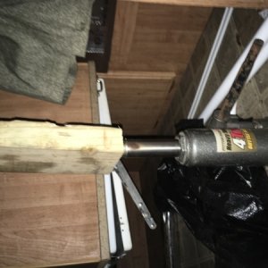 this is how I tested my theory I used 2x4 and made a T out of them. Then I put the bottle jack under it with roof down and jack it up until the sag wa