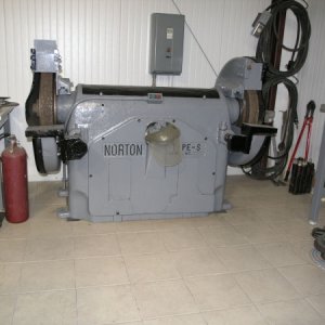 Cool old grinder made by Norton abrasives, 20HP 3 phase, 30"X3" wheels.
can be seen in operation on You Tube, I let someone record and upload it, List