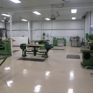 On the left 36” belt sander, toward the middle a stroke sander Oliver, on the right Rockwell 7.5hp shaper. In the back is a Yates American lathe and t