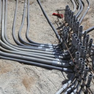 Closer view of conduits terminaton, the 4 sub panels sit above this location.