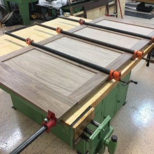 cabinet panels glued and clamped, this 4 panel unit is the back panel for the island cook-top.