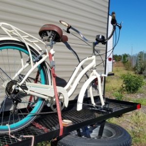 Bulky beach cruiser mounted. Mountain bikes nest just fine across the front of the truck bed but the beach cruiser is better handled on the rack. I wi