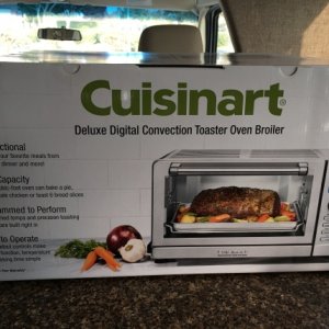 No oven?  NO PROBLEM!  Bought this little gem on sale at Costco for $79.  Uber Super Convection/Broiler/Toaster/Oven.  Cooked our Thanksgiving turkey 