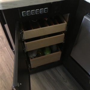 Installed small drawers for flatware and cleaniyproductd next to dishwasher