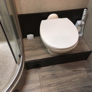 installed tile under toilet