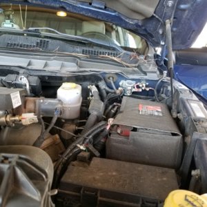 This picture shows the 6 ga wire running from vehicle battery,  through a circuit breaker and solenoid, then onward to the rear bumper winch connector