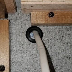 under cabinet hole with grommet