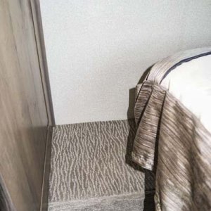 28SS - Bedroom - Step Up - There is a step up next to each side of the bed that is carpeted