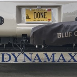 Installed blue vinyl wrap on inside of Dynamax name and emblems.