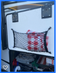 Boat console new mounted on the inside of the underneath storage compartment door.