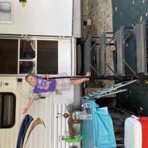 Granddaughter showing off camper