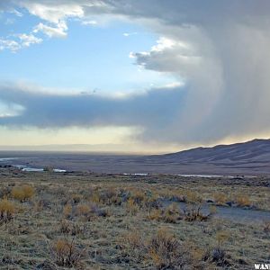 High Dune with Clearing Storm