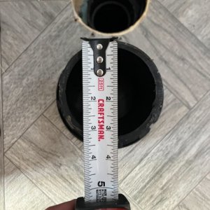 Diameter of pipe descending from toilet flange. 
It is 3" nominal (3.5" OD)