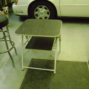 Folding table from a useless lawn chair