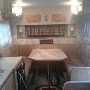 Inside kitchen dinette view taken from back of camper