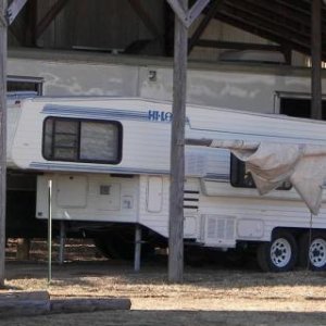 Sting32's 95 5th, side view, Lowered, next to a 97 Sahara Safari Motorcoach