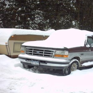 UPSTATE 3/2011 KEPT SNOW BRUSHED (SHOVELED) OFF & AWAY FROM THE SIDES/FRONT/BACK NOT THAT I HAD TO ROOF IS PLENTY STURDY ENOUGH