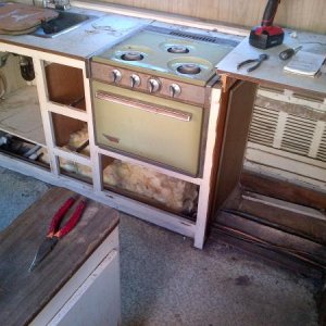 Removed all the cabinet doors and hardware. Going to use as much as possible, but there is water damage and 90% of the wood has mold and got to go.