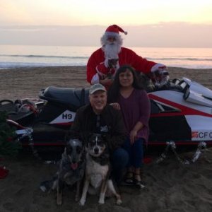 Santa on the Beach adventures -- Santa on a wave runner for the holiday party at Bolsa Chica 11 December 2016. Cooper loves Santa (Cooper the Texas He