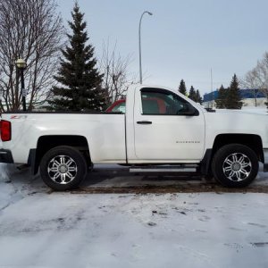 Added a 2.25" Leveling kit and went to18" rubber from the stock 20"