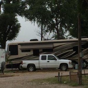 Our next door neighbor puts our baby to shame.  (Our truck-pictured-broke down and we had to stay extra days.  Fuel pump burnt up due to faulty gas ga