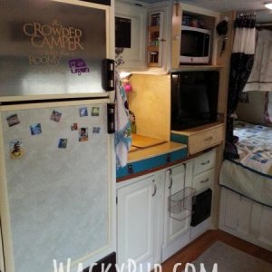 This is a not very good picture of My Kitchen where you can see how I raised to the sink and counters. I removed the little stove and replaced it with