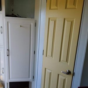 We painted the bathroom door Yellow to go with the blue walls.  I love the cheery yellow door.