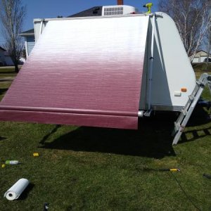 Score! Burgundy fade awning for the wee house on wheels. Found on eBay for $75. Easy install!