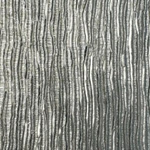 Self-stick embossed "faux metal" wallpaper. Entire front wall of unit (kitchen) will be covered in this.