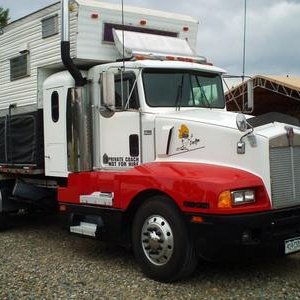 2900828369865-1989-KW-T600-with-10-12ft-Cabover-Campe