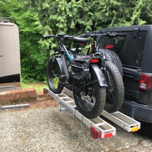 Modified Black Widow dual motorcycle rack to squeeze the bikes closer to the Jeep, and closer to each other. Reduced the rear hang distance by about 1