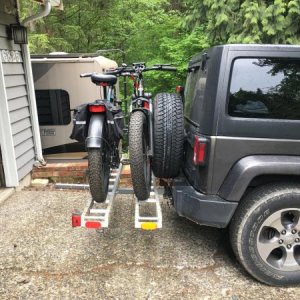 Modified Black Widow dual motorcycle rack to squeeze the bikes closer to the Jeep, and closer to each other. Reduced the rear hang distance by about 1