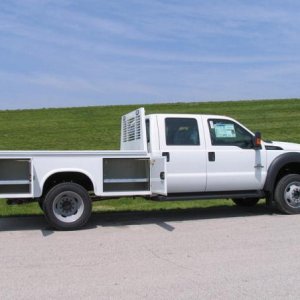 While this is a Ford, our crew cab Ram 3500 dually will be up fitted with this low-profile Knapheide Westerner utility bed and a Reese Elite 25k hitch