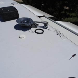 01 select location

Pulled antenna up to roof using rope and rear ladder as guide.