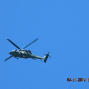 When you're taking a lot of photographs around an Army Base, expect to be "checked out."  This guy actually hovered over us for a few seconds, then fl